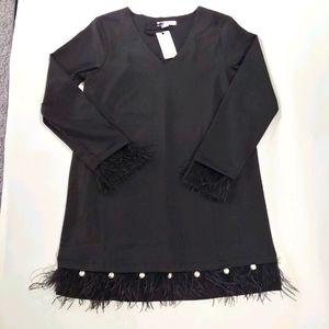 Black loveriche dress with feathers and pearls